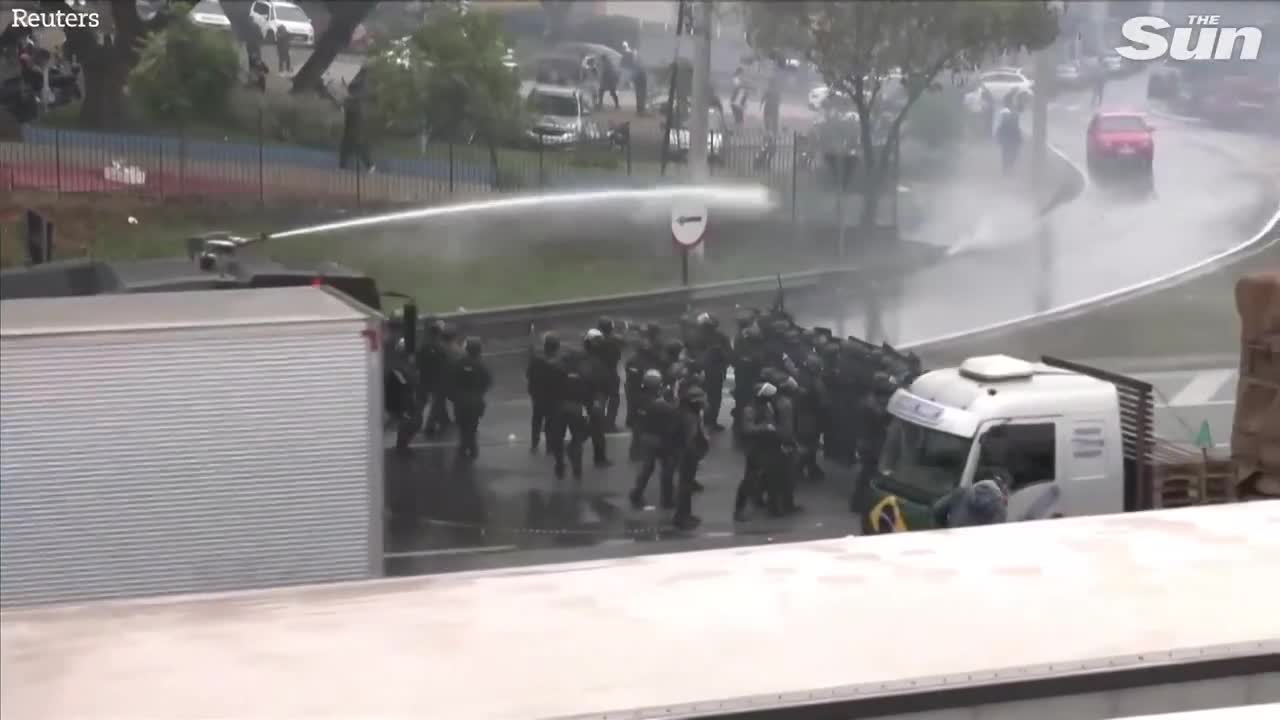 Brazilian police fire water cannons and rubber bullets at anti Lula protesters