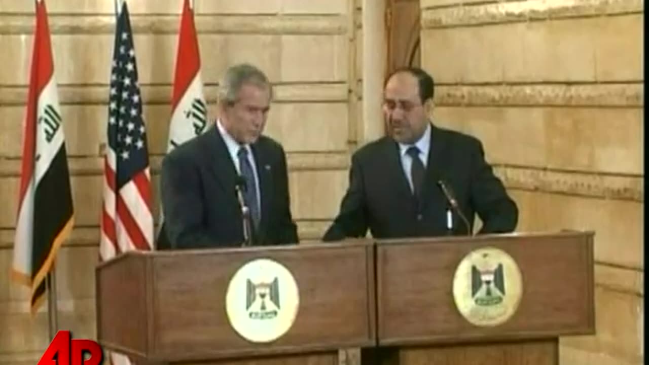 A Blast from the past - Reporter throws shoes at GW Bush LOL