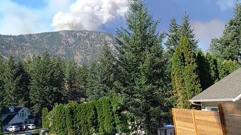 West Kelowna Forrest fire big plooms of smoke on the mountain.