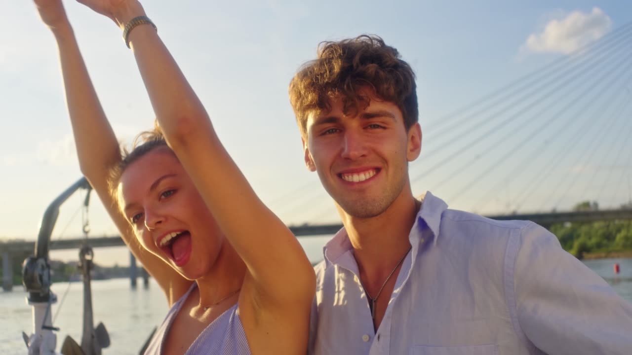 A happy couple dancing on a sunny day