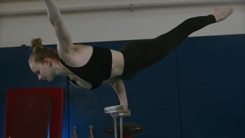 A Women Hand Standing at the Gym