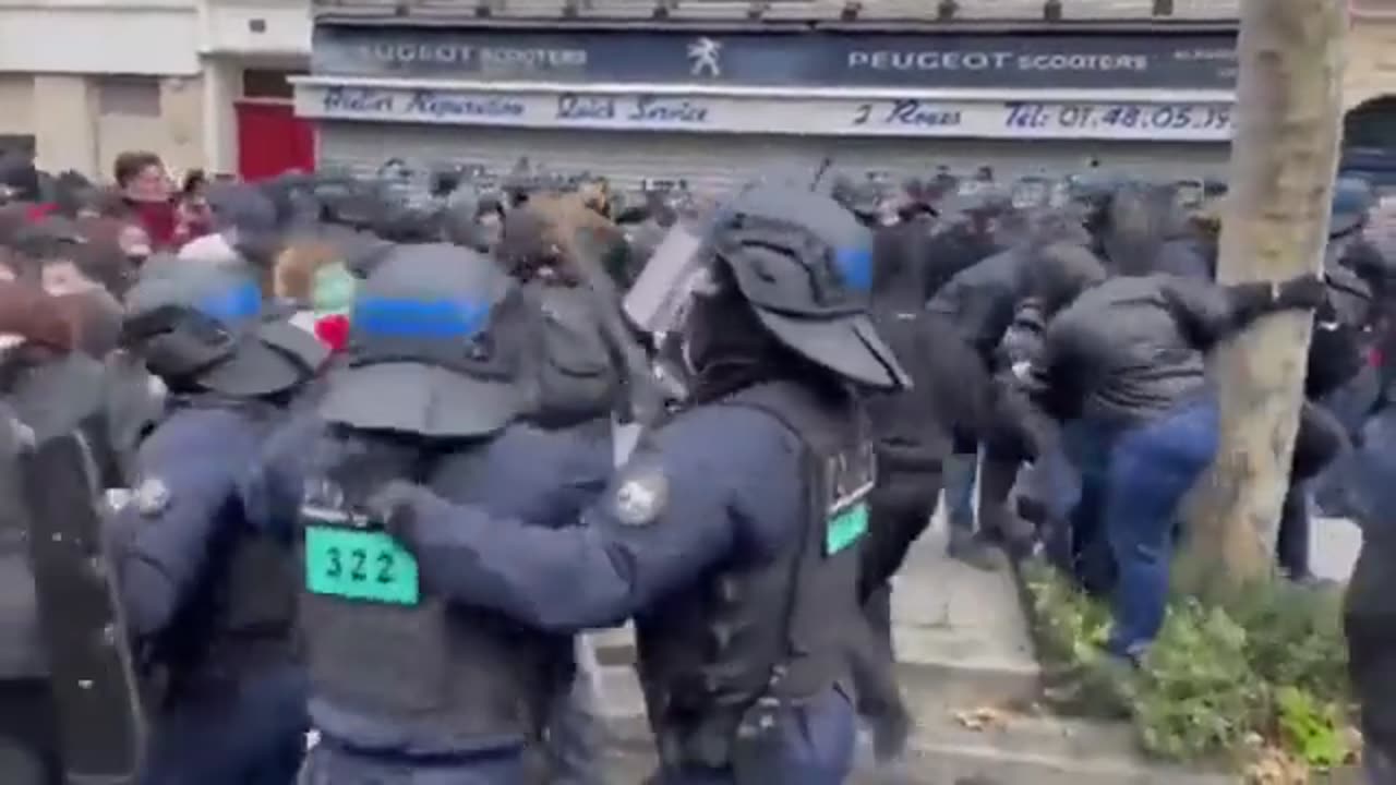 French citizens who literally have their backs turned to the police are being beaten...