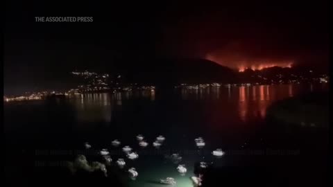 Fires scorch Greek islands of Rhodes and Corfu