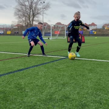 Ball manipulation with two U10 Arsenal Girl Ballers,