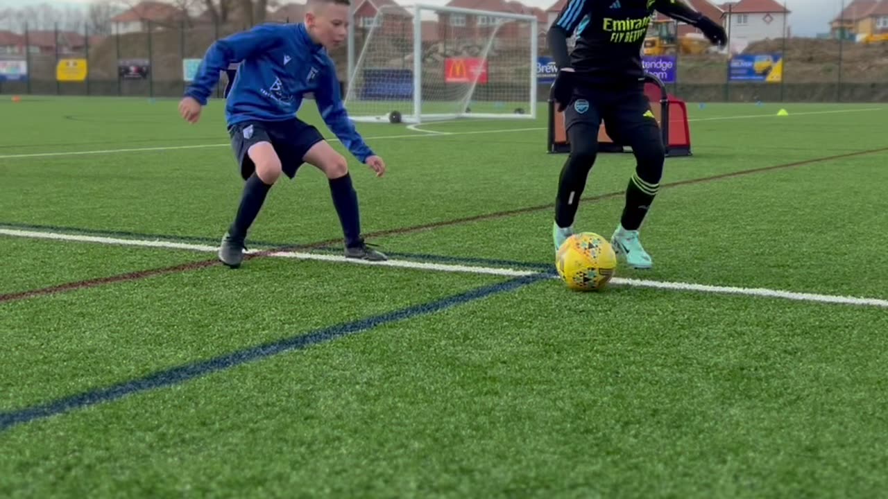 Ball manipulation with two U10 Arsenal Girl Ballers,