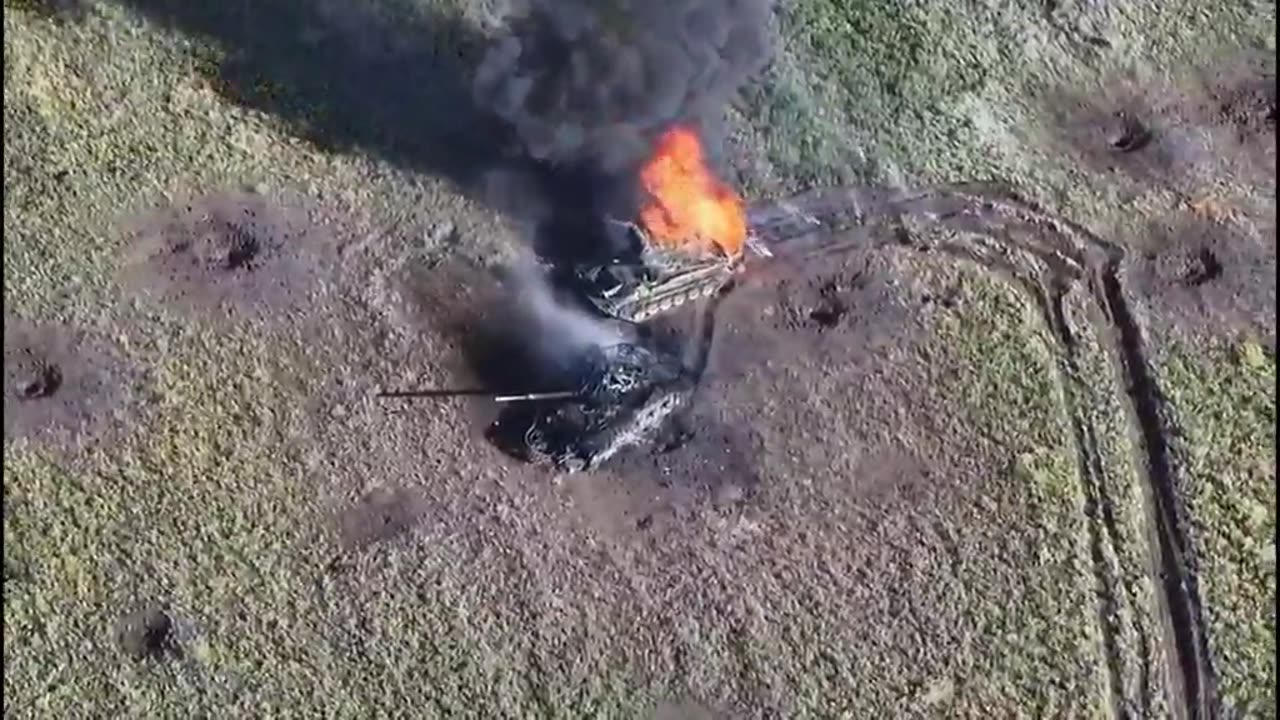 Russian Tank Lights Up After Drone Stike