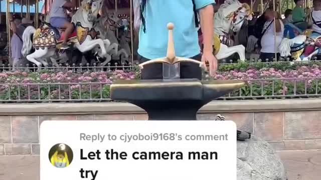 MY CAMERA MAN PULLED THE SWORD OUT OF THE STONE RIGHT IN FRONT OF ME IN DISNEY WORLD