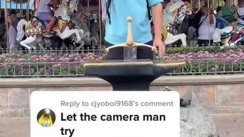 MY CAMERA MAN PULLED THE SWORD OUT OF THE STONE RIGHT IN FRONT OF ME IN DISNEY WORLD