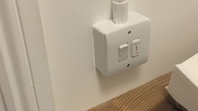 Where’s the light switch for the toilet?