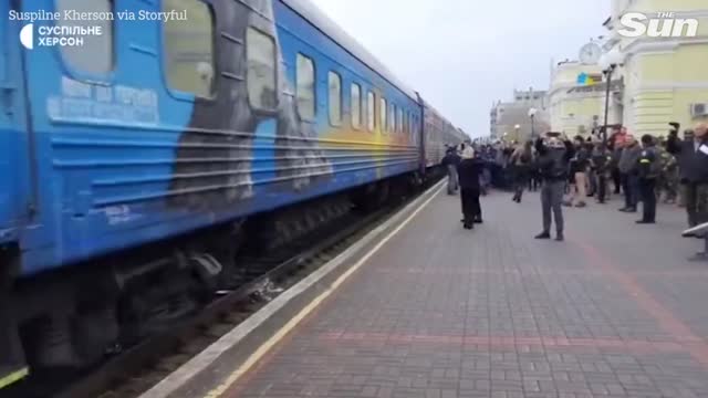 Crowds greet first train from Kyiv to arrive in Kherson since Russians fled