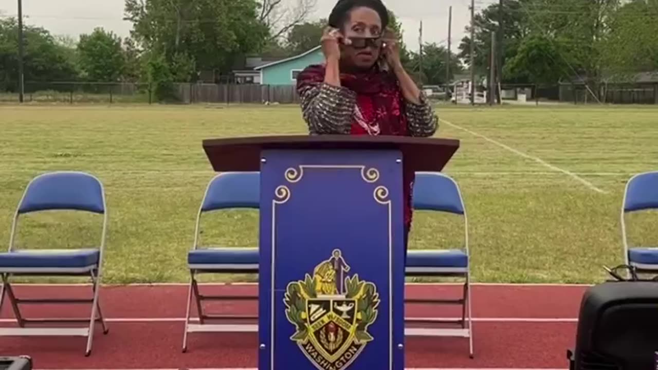 Congresswoman Jackson-Lee trying to figure out how to wear her eclipse glasses