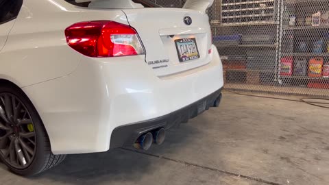 INSTALLING MY INVIDIA GEMINI R400 EXHAUST ON MY STI!!. PLEASE DO LIKE AND FOLLOW SHOW SOME SUPPORT