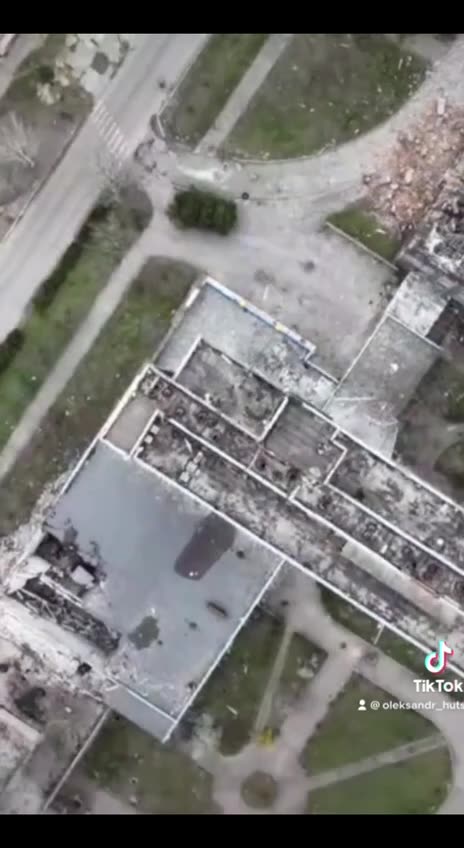 Ukrainians Bomb AAA and Coms onto ofHighrise building in Occupied Dontesk