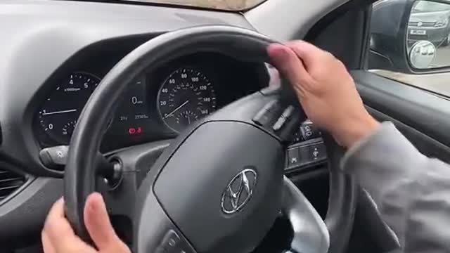 The habit of holding the steering wheel while driving. Steering wheel driving