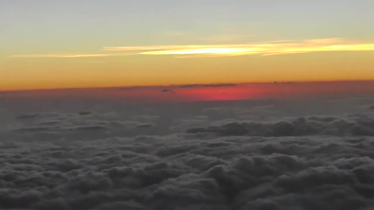 Why Is The Sun Rising Out Of The Clouds In Front Of The Horizon?