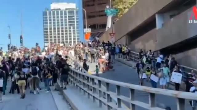 Los Angeles, Happening Now: POLICE again fend off protestors attempt on entering freeway,