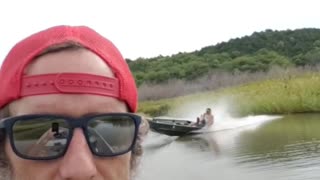 Weeds in Propeller Send Friend into Water