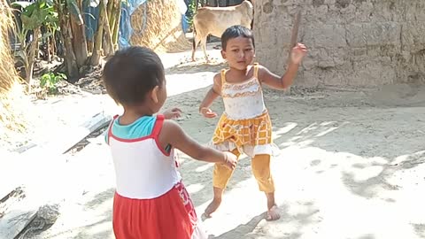 Funny baby playing with friend