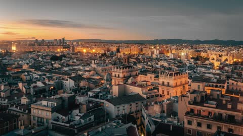 POV: you're in roof top of a special event in Valencia-having some drink and chilling with city view