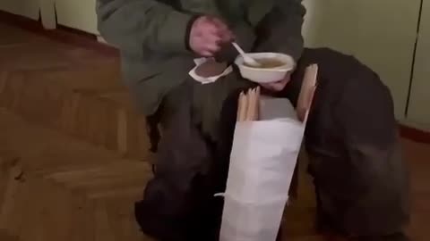 Russian POWs Receive Food and Medical