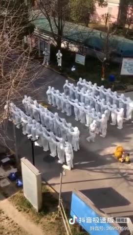 Chinese Stormtroopers Dance During Morning Call Before Going Door-to-Door to Perform COVID Tests