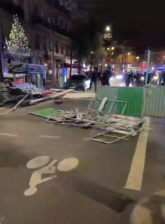 The French people running rings around the police as they hit Paris again tonight.