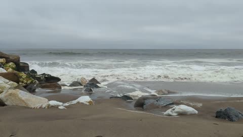 Calm Clouds and Powerful Waves