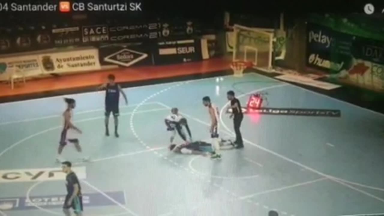 Spain: Basketball player collapses