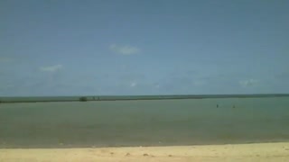 Vista para a praia distante, dá pra ver os pescadores no meio do mar [Nature & Animals]