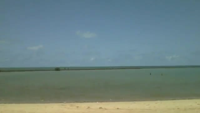Vista para a praia distante, dá pra ver os pescadores no meio do mar [Nature & Animals]