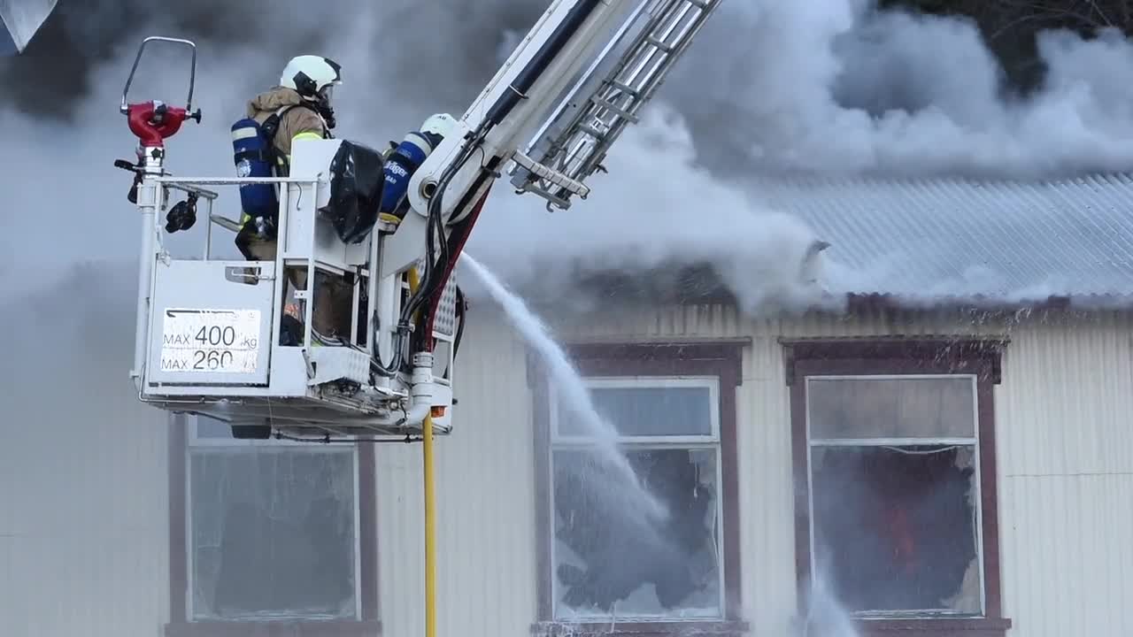 Firefighters Putting out Fire