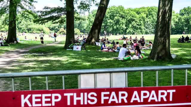 Vaccinated can go maskless outside, except in crowds