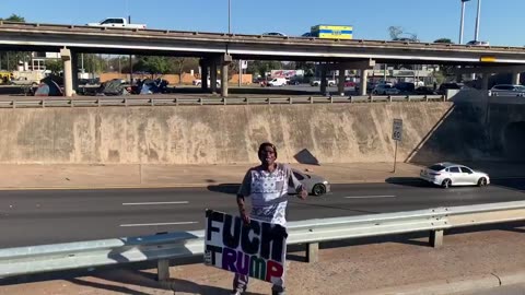 Homeless man tells me Democrats pay him to hold a 'f*ck Trump' sign.