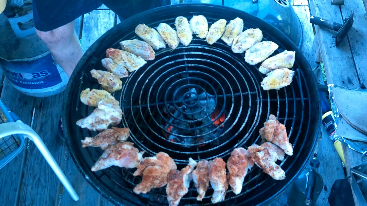 Grilling chicken wings on the kettle grill