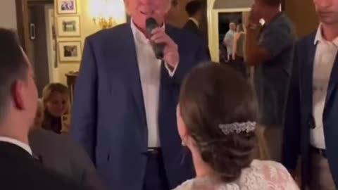 President Trump crashes a wedding at his club after being “arrested”