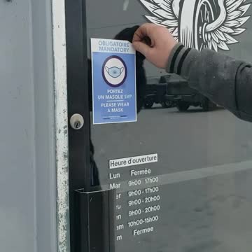 Canadian Business owner tears down his mandate signs!
