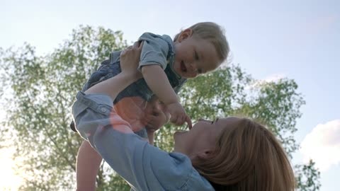 A Happy Mother And Child Together - Jisab