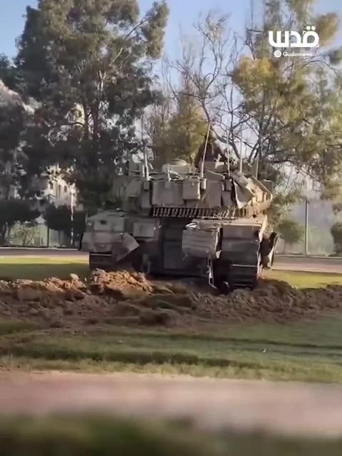 Isreali soldiers detain stripped Palestinian men in sports arena