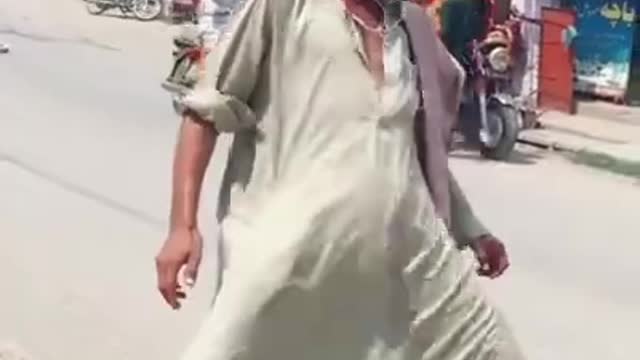 Mad Man Dancing on Road