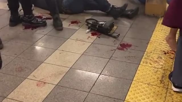 Medic helps shot wounded man inside #Brooklyn subway #subway #brooklynsubway #brooklynattack