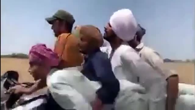 All the Indians get on a motorcycle