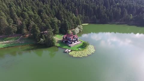 Elevated perspective on a house by the lake