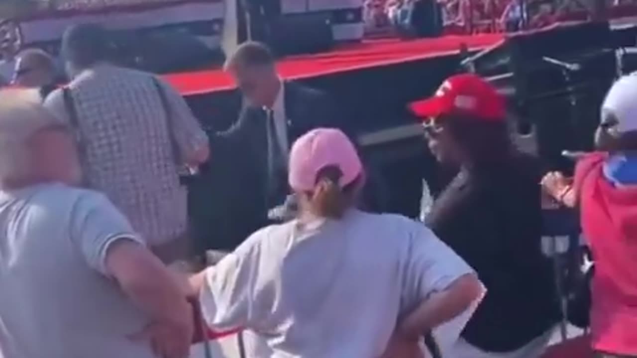 Who is this guy who moves people right before the Trump assassination attempt and then ducks down