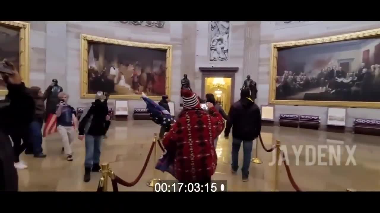 John Earl Sullivan in Rotunda with CNN Jade Sacker during Antifa Capitol Larp