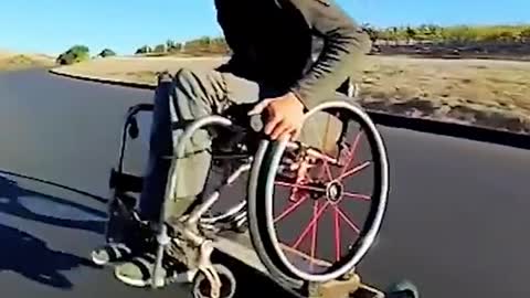 skateboard in wheelchair