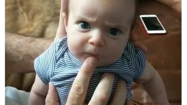 angry baby speaking with father