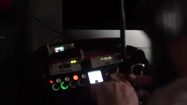 Man pressing buttons on a machine_batch