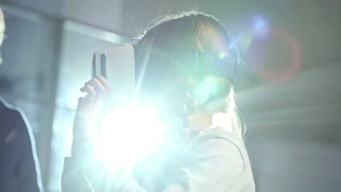 A Girl Wearing A Virtual Reality Headset