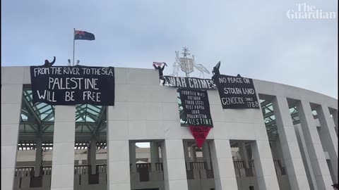 Pro-Palestine protesters hang banners from Parliament House roof in Canberra