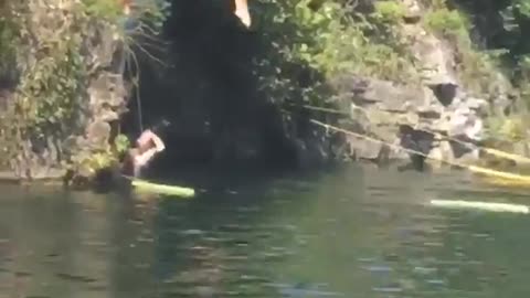 Girl faceplants jumping into water